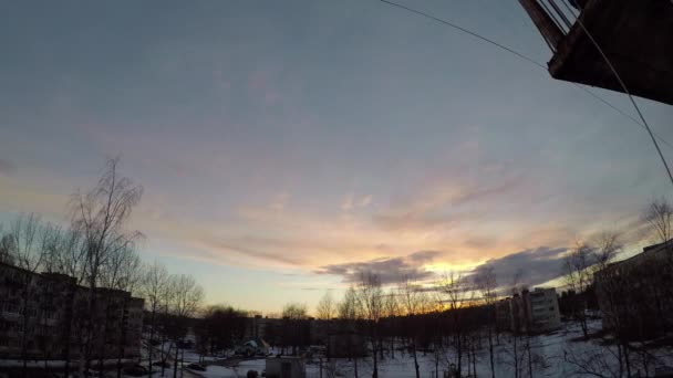 Zonsondergang in de winter in Begunitsy timelapse video. — Stockvideo