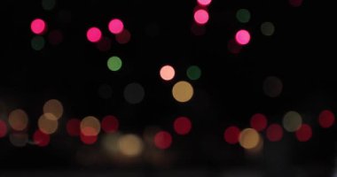bokeh arka plan. Garland çok renkli soyut yanıp sönen arka plan bulanık