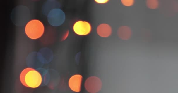 Фон боке. Блимаюча гірлянда Різнокольоровий абстрактний розмитий фон — стокове відео