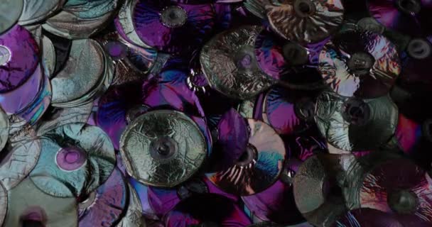 Compact discs melt under the powerful hot flame of fire — Stock Video