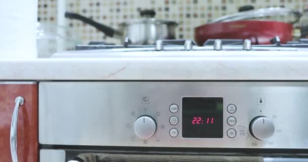 Electronic time on a modern stove — Stock Video