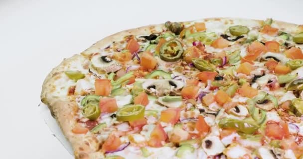 Delicious and appetizing pizza is spinning — Stock Video