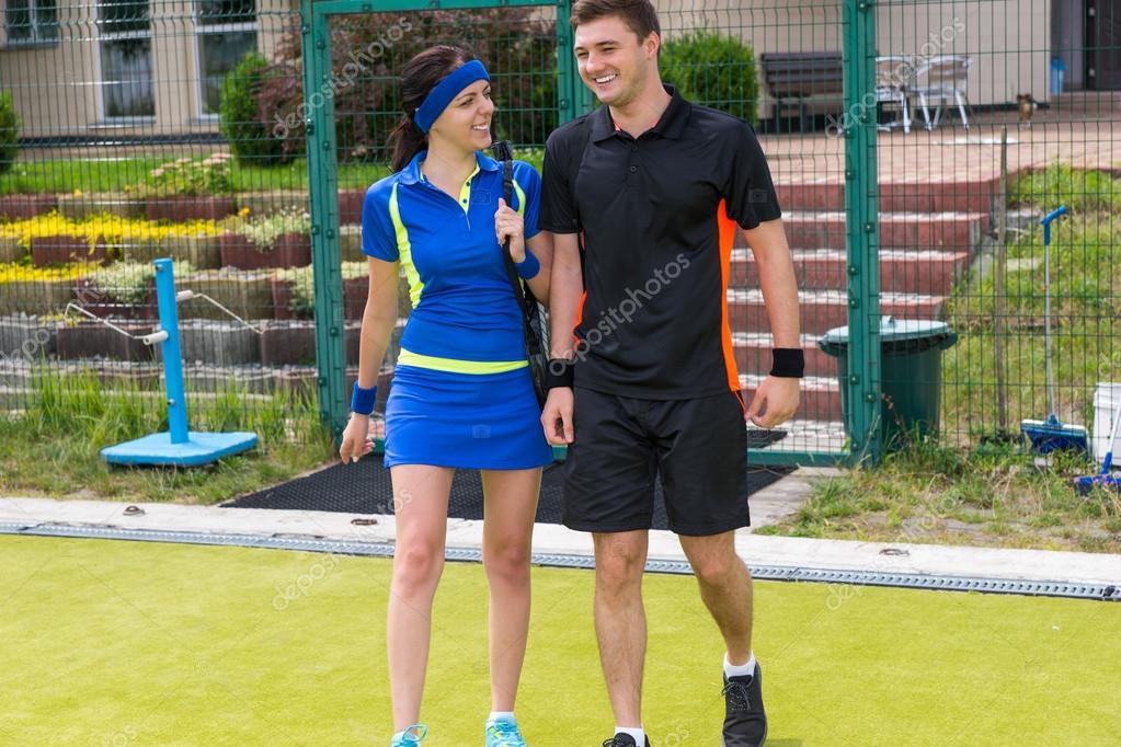 portrait-of-male-and-female-tennis-players-stock-photo-vaicheslav