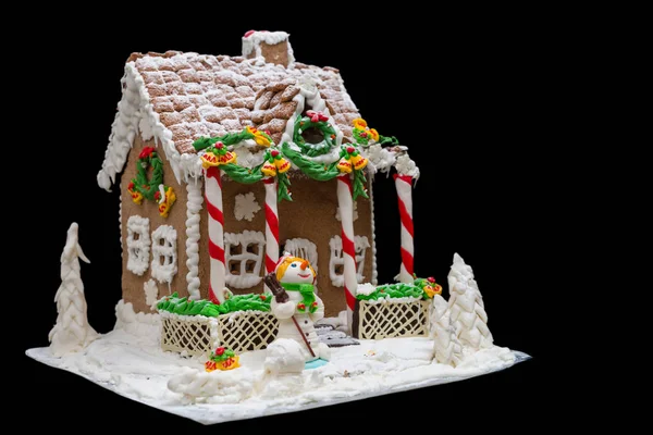 Gingerbread house, gingerbread Christmas tree and a sugar mastic — Stock Photo, Image