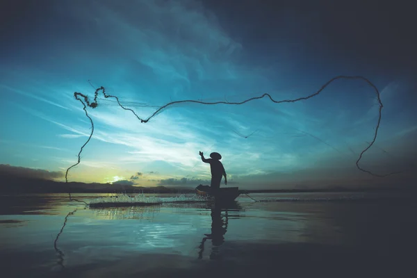 Silhouette of fishermen — Stock Photo, Image