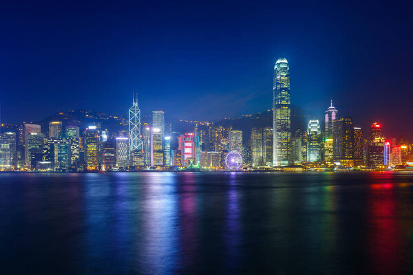 Victoria harbour skyline at night in Hong Kong