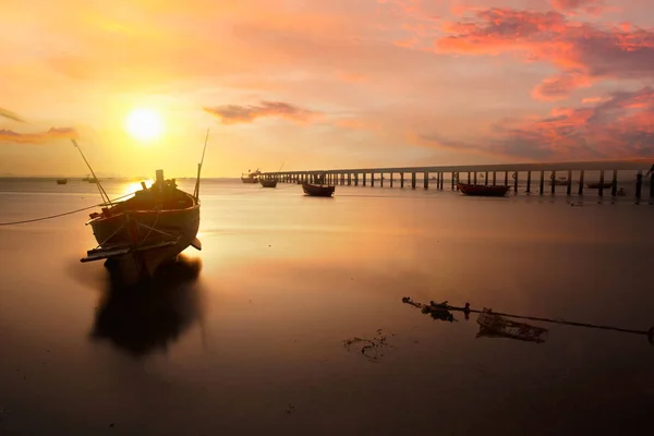 Fishing boat at sunset — Stock Photo, Image