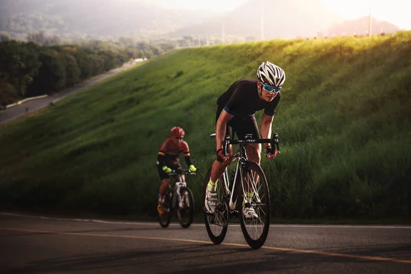 Cyclist in maximum effort in a road — Stock Photo, Image