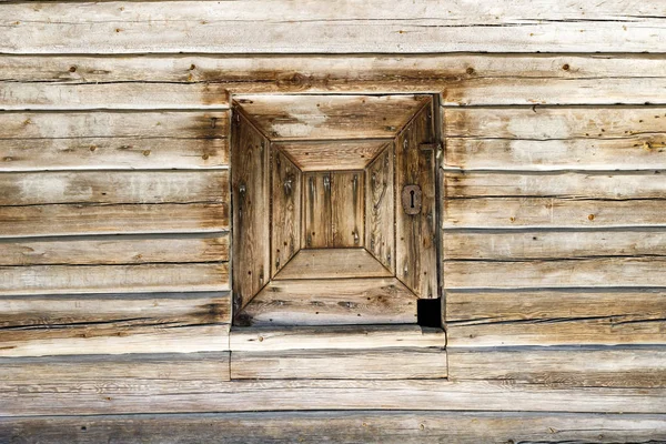 Timber made hatch in a wooden wall — Stock Photo, Image