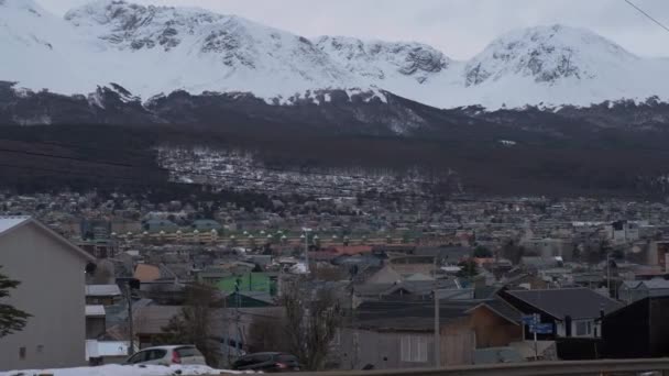View of Town In Ushuaia With Snow Capped Mountains in the background — Stock Video