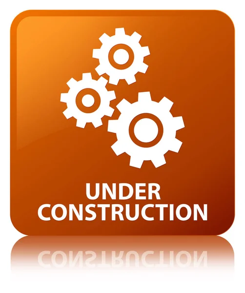 Em construção (ícone de engrenagens) botão quadrado marrom — Fotografia de Stock