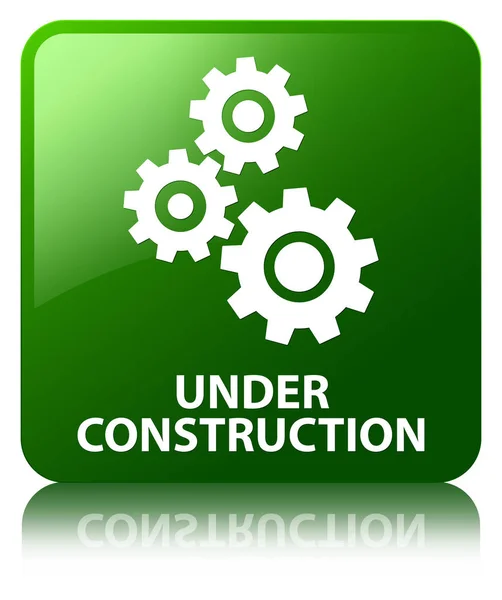 En construcción (icono de engranajes) botón cuadrado verde —  Fotos de Stock