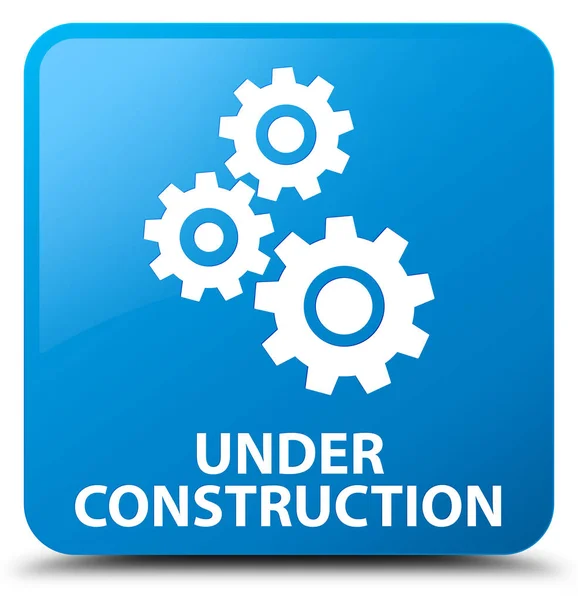 Em construção (ícone de engrenagens) botão quadrado azul ciano — Fotografia de Stock