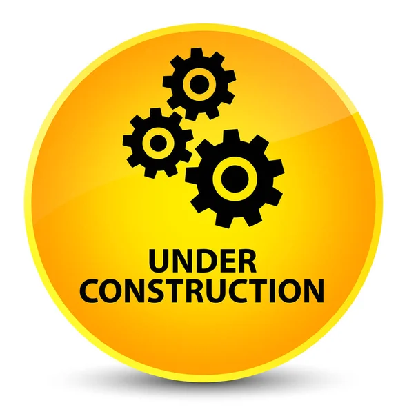 Under construction (gears icon) elegant yellow round button — Stock Photo, Image