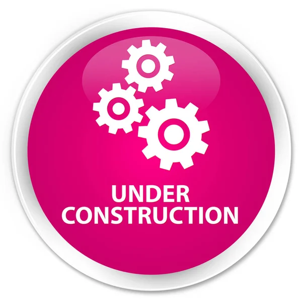 Em construção (ícone de engrenagens) botão redondo rosa prémio — Fotografia de Stock