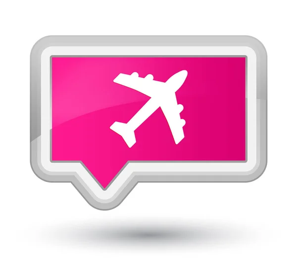 Розовая кнопка с изображением самолета — стоковое фото