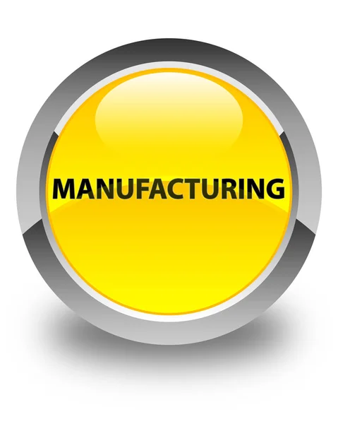 Manufacturing glossy yellow round button — Stock Photo, Image