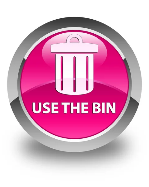 Use the bin (trash icon) glossy pink round button