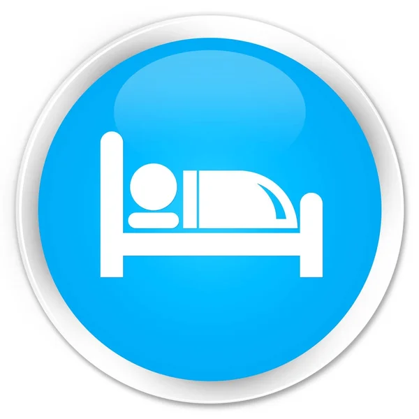 Синяя круглая кнопка с изображением кровати отеля — стоковое фото