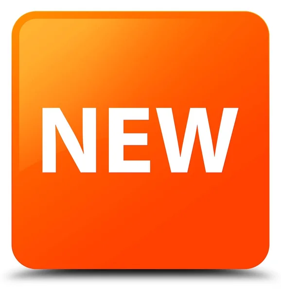 Новая оранжевая кнопка — стоковое фото