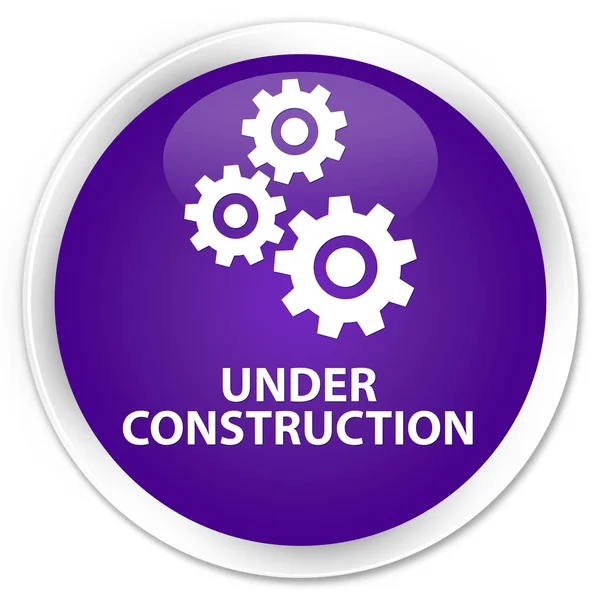 En construcción (icono de engranajes) botón redondo púrpura premium —  Fotos de Stock