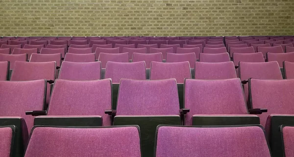 Empty rows of seats in auditorium or concert hall.Close up,selective focus.Concept of quarantine,curfew,cancellation of mass events to prevent coronavirus,losses of organizers in entertainment sector