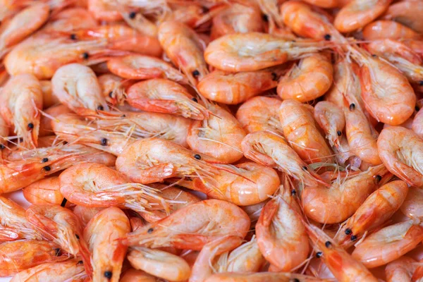 Boiled shrimps on white background. macro.