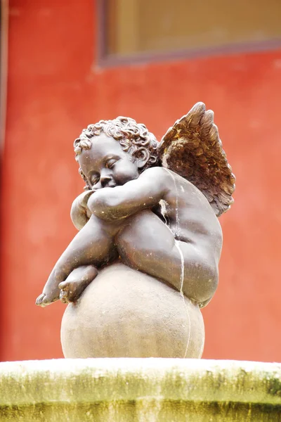 Cupido Sentado Piedra — Foto de Stock