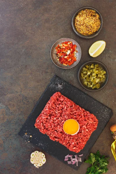 Raw beef with other ingredients for steak tartare — Stock Photo, Image