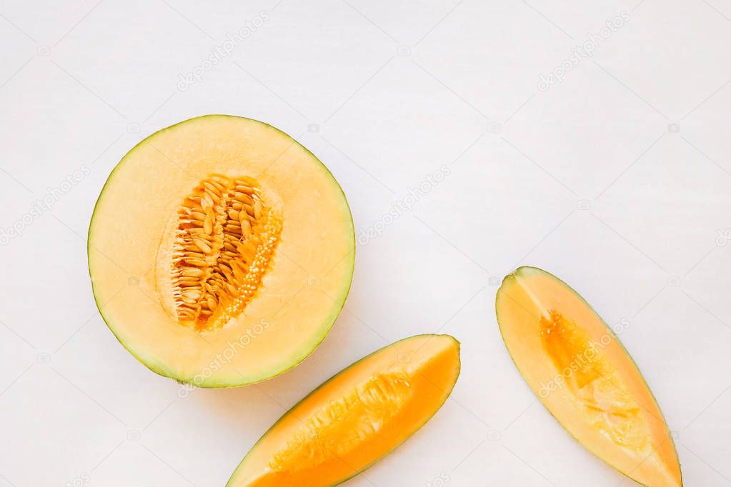 Ripe melon half and  slices 