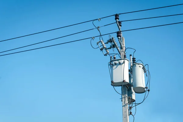 electric pole and electric transformer with blue sky