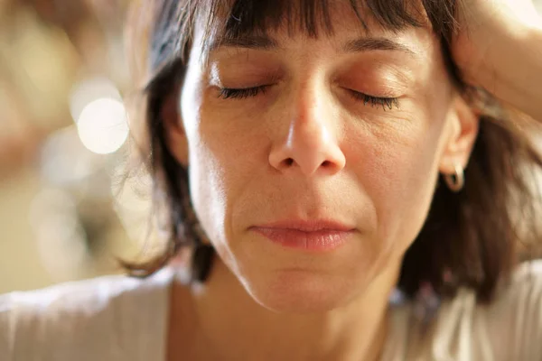 Caucasian Woman Taking a Nap Eyes Shut.