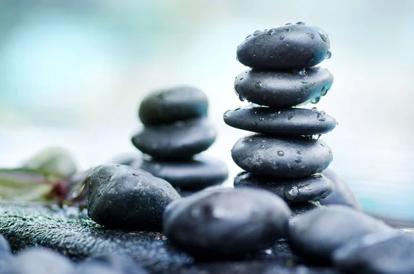 Heap of spa stones with water drop still life style Stock Photo