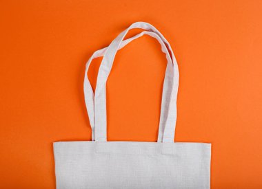 Sarı arka planda eko torba. Metin için fotokopi çekilen bir yer. Ekoloji Kurtarma Konsepti. Üst görünüm.