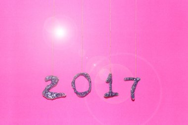 pembe bir arka plan üzerinde glitter ile yapılan 2017