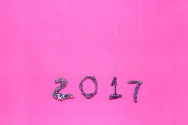 pembe bir arka plan üzerinde glitter ile yapılan 2017