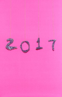 pembe bir arka plan üzerinde glitter ile yapılan 2017