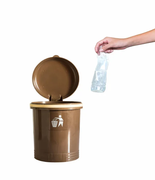 Kéz, amivel egy üveg újrahasznosítás bin — Stock Fotó
