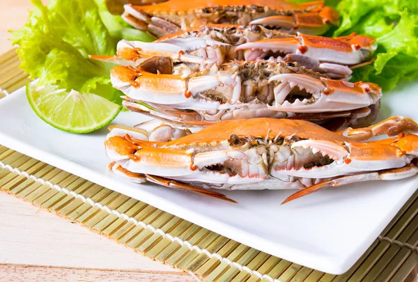 big crabs boiled with vegetable