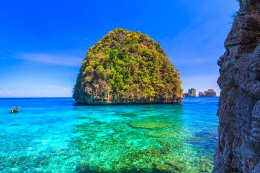 Beautiful Ao Lo sa ma is snorkeling point famous tour lagoon in Phi Phi Islands Thailand clipart