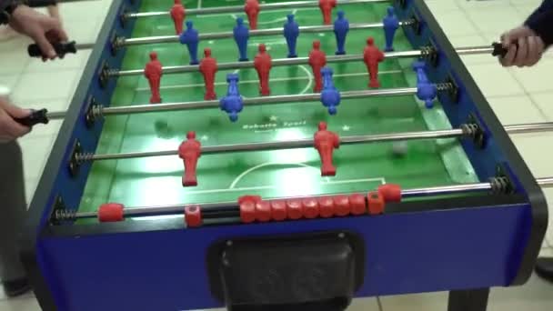 MOGILEV, BELARUS 09.06.19: Young guys play table football, close-up, sporting — Stock Video