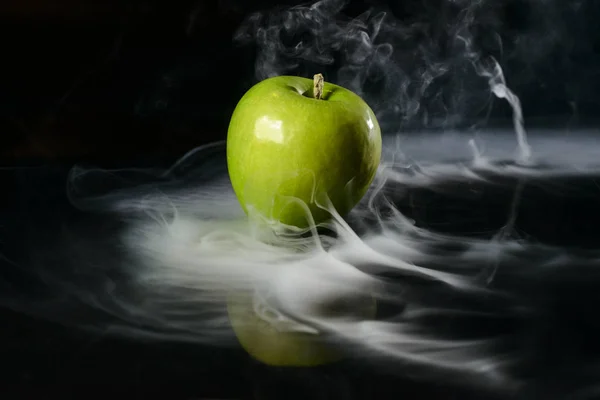 Apple in fragrant smoke — 스톡 사진