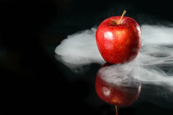 Apple in fragrant smoke — Stok fotoğraf