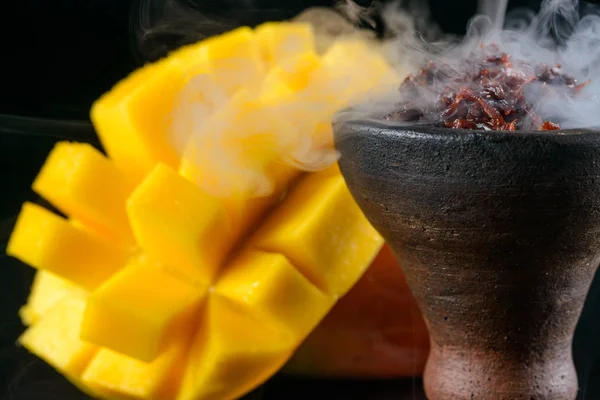 Exotic tobacco with mango — Stock Photo, Image