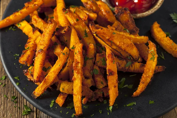 Zelfgemaakte frietjes biologische pompoen — Stockfoto