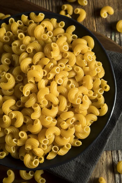 Macarrones de codo orgánico crudo — Foto de Stock