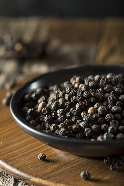 Raw Organic Black Peppercorns — Stock Photo, Image