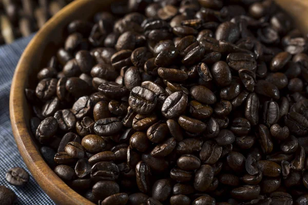 Granos de café marrón tostados orgánicos — Foto de Stock