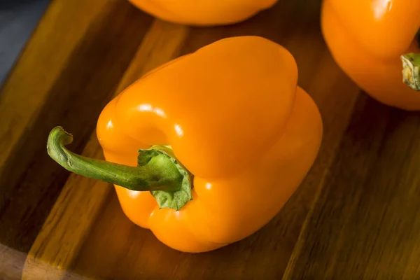 Raw Organic Orange Bell Peppers — Stock Photo, Image