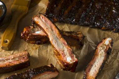 Homemade Smoked Barbecue St. Louis Style Pork Ribs clipart